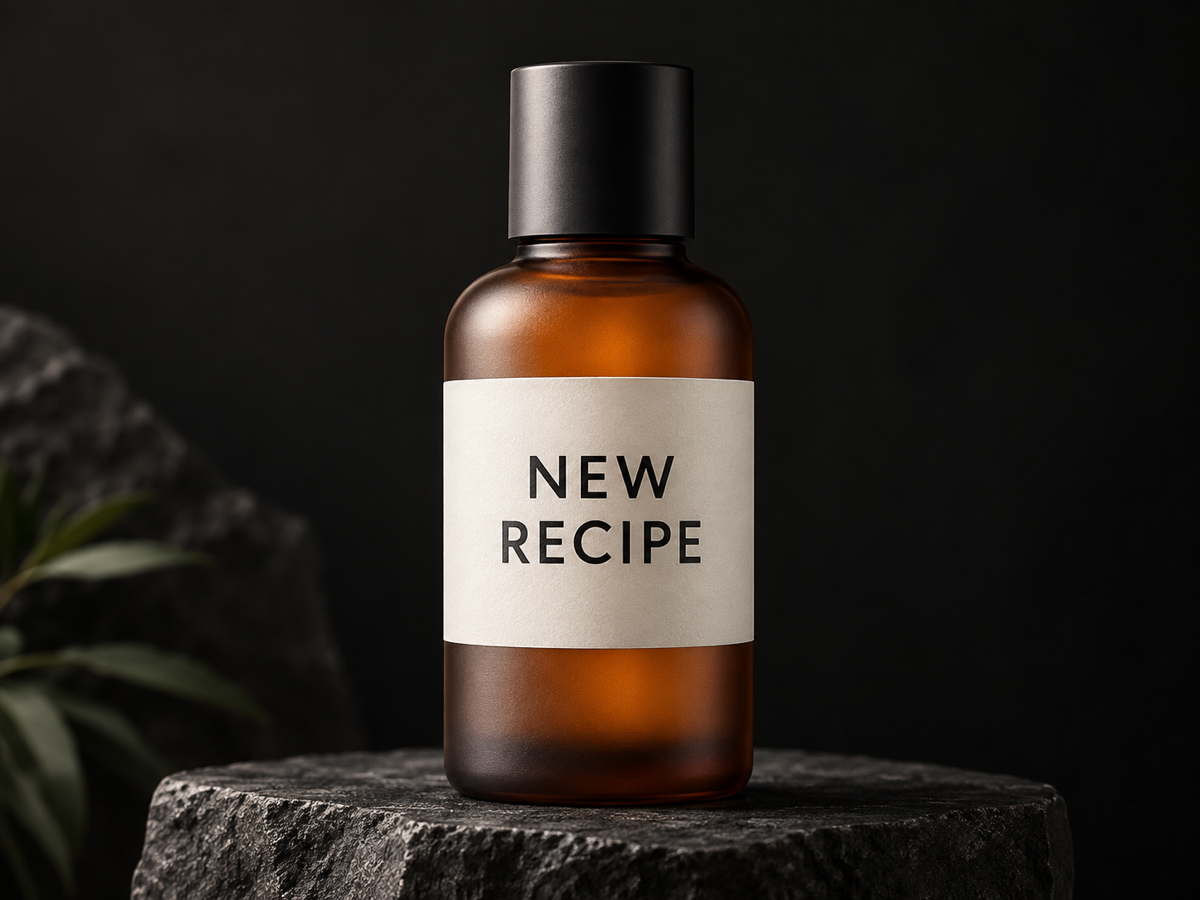 Product packaging label edited to read NEW RECIPE while the bottle and lighting stay unchanged